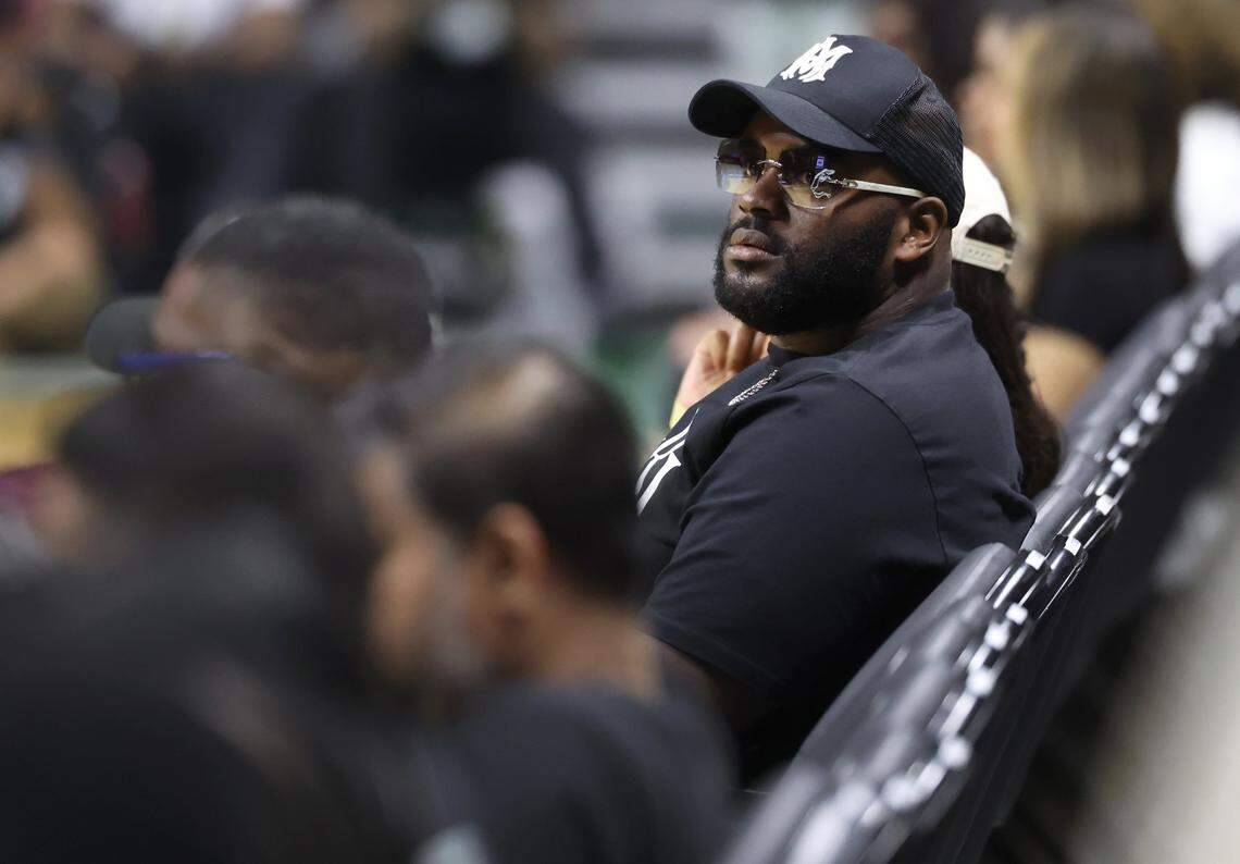 Carolina Panthers offensive tackle Taylor Moton sits courtside at the Chewy Takeover Celebrity Basketball Game at UNC Charlotte on Sunday, April 12, 2026. The game brings together professional athletes, entertainers and regional influencers for a high-energy community event.