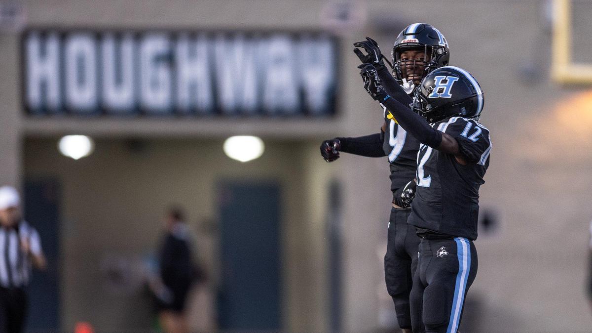 Hough’s Samari Matthews, left, and Hough’s Reggie Rainer jr celebrate a touchdown against Julius Chambers at Hough High School in Cornelius, N.C., on Friday, September 22, 2023.