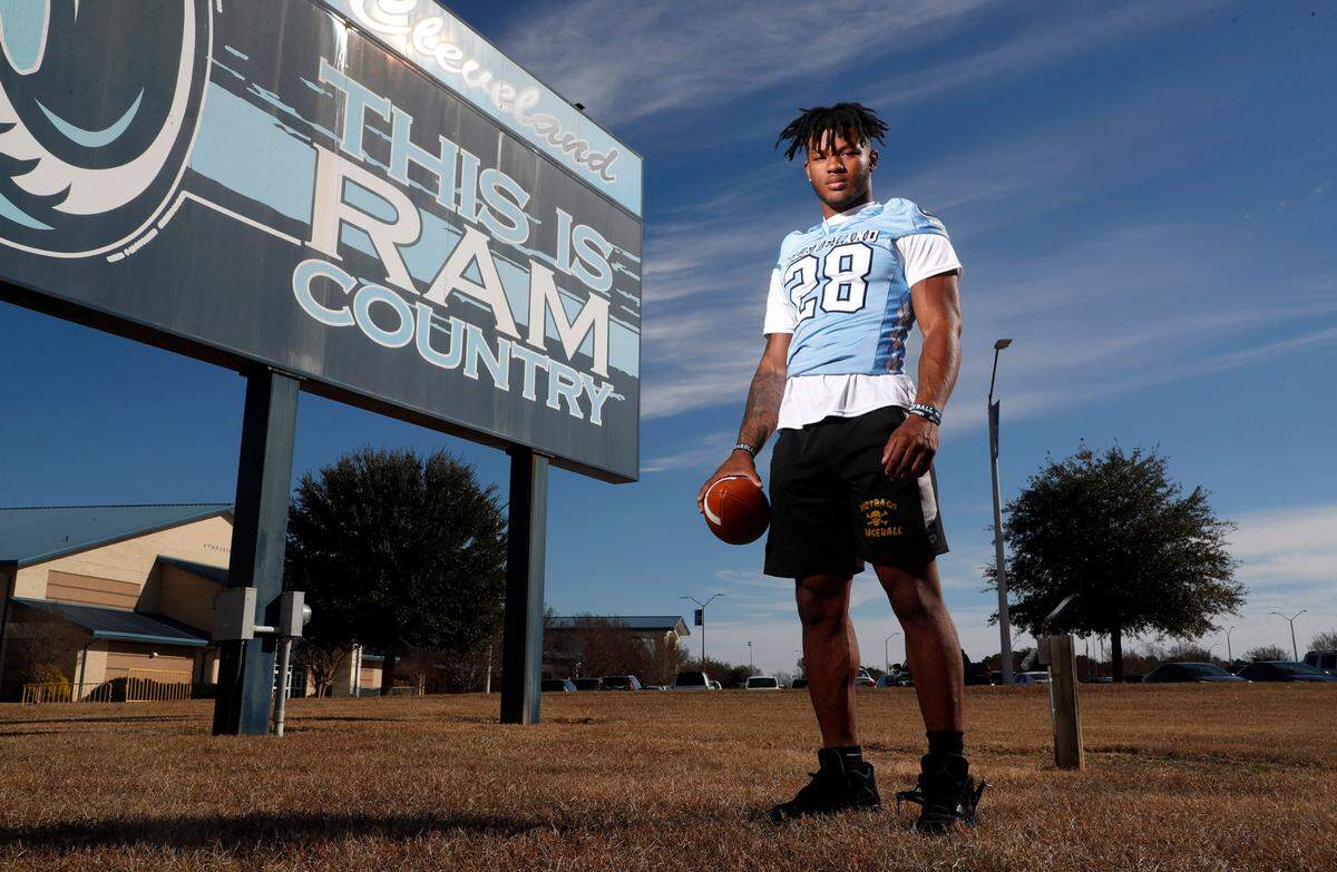 Omarion Hampton, running back at Cleveland High School in Clayton, N.C., poses outside the school on Wednesday, December 1, 2021.