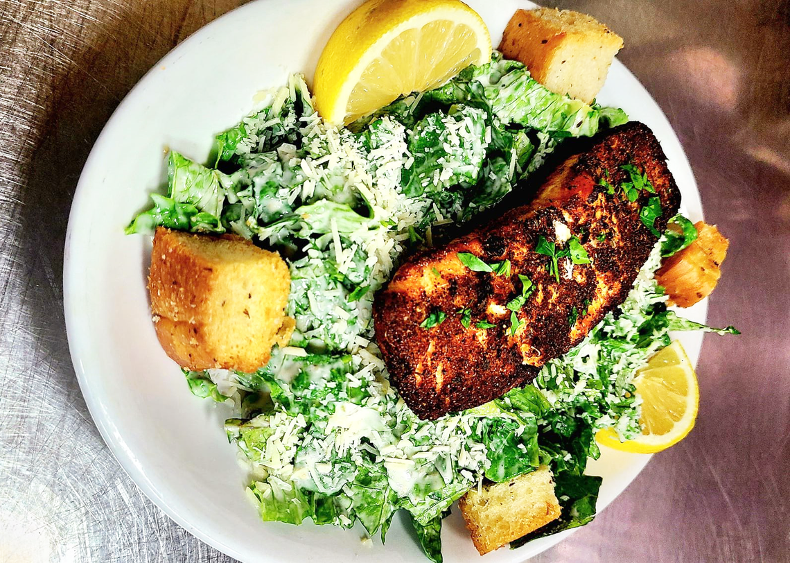 Restaurant X Bistro’s Blackened Salmon Caesar Salad is available at lunch, served Wednesday through Saturday.