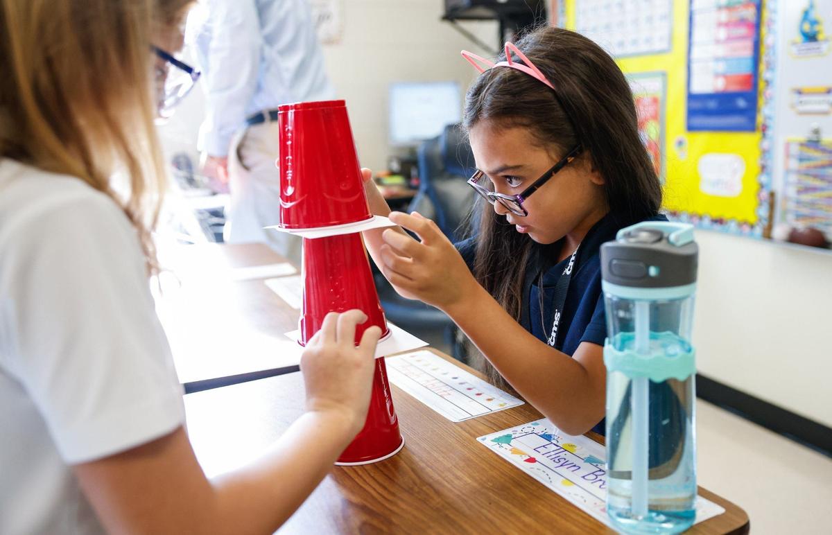 Third grade students work on a partner exercise during the first day of school at Idlewild Elementary School in Charlotte, NC on Monday, August 26, 2024.