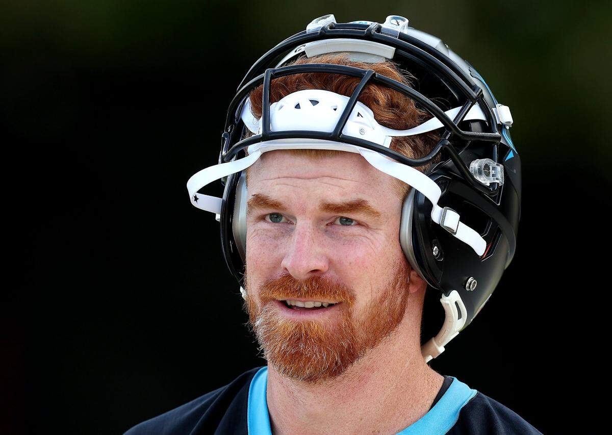 Carolina Panthers quarterback Andy Dalton walks to practice on Monday, November 18, 2024.