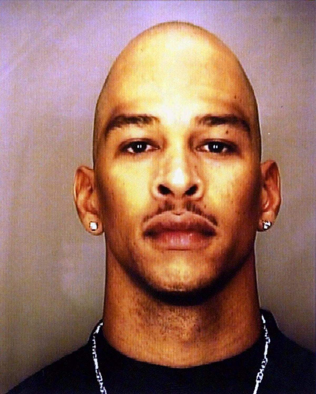 FILE -- Rae Carruth is shown in this November, 1999 jail mug shot. Van Brett Watkins, accused of shooting the girlfriend of former professional football player Rae Carruth pleaded guilty to second-degree murder and other charges Monday July 31, 2000 in Charlotte, N.C., a prosecutor said. (AP Photo/ho)