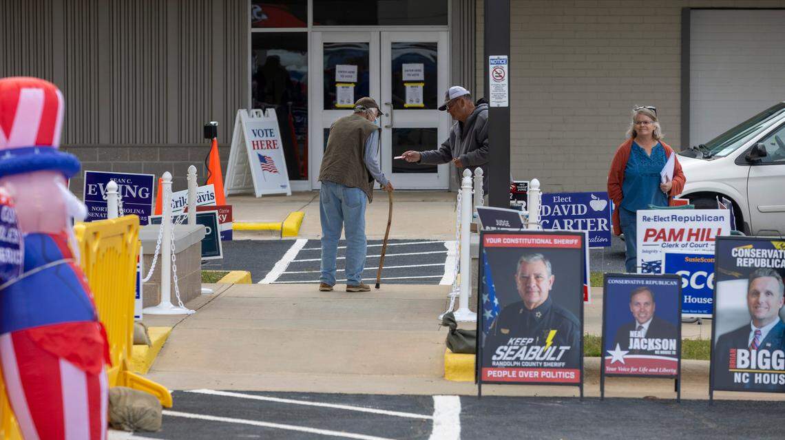 A early voter walks to the entrance of the Randolph County Board of Elections on N. Fayetteville Street to cast their ballot on Thursday, October 27, 2022 in Asheboro, N.C.