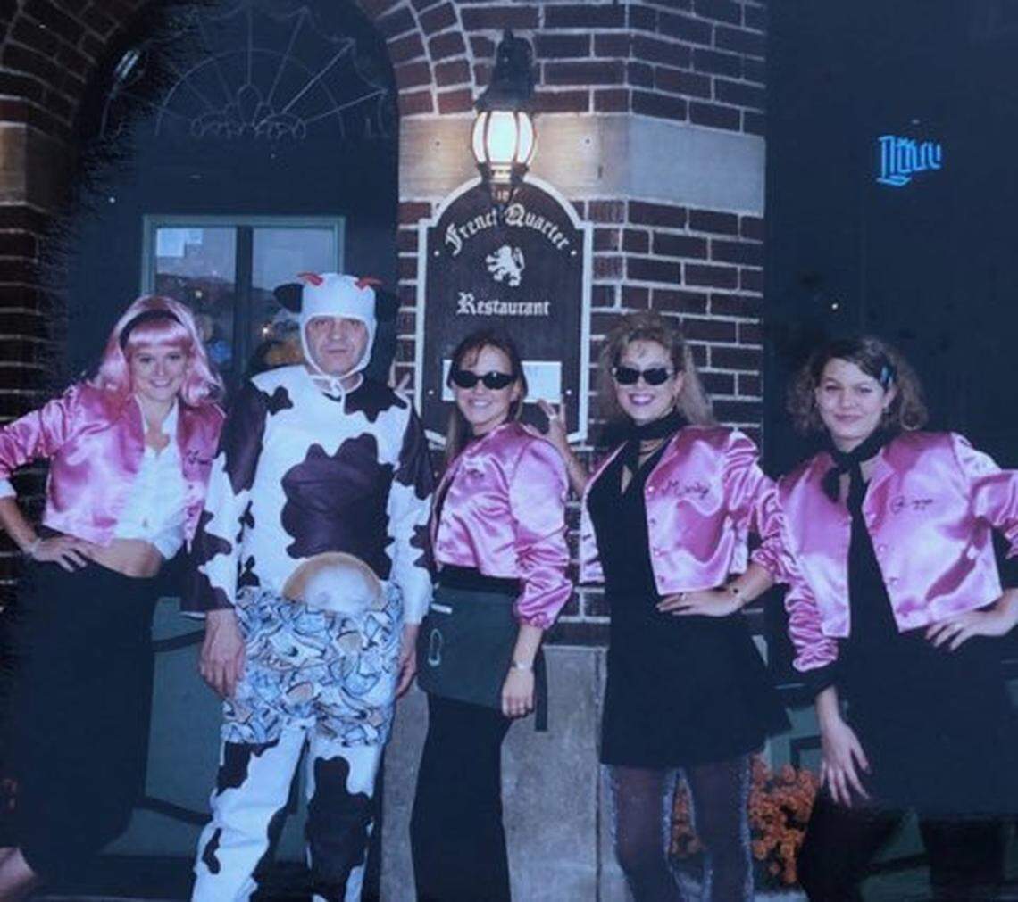 Panos Photopoulos dressed in a cow costume outside his French Quarter Restaurant one Halloween.