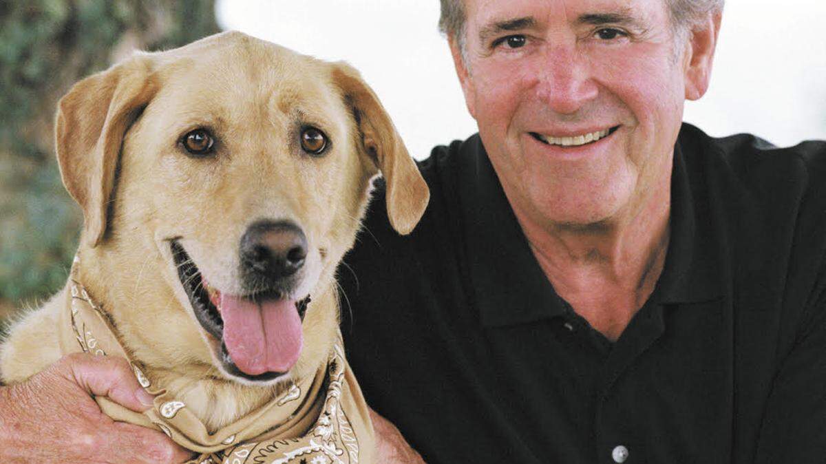 David Hoyle, a longtime state senator for Gaston County, and his dog Casey. Hoyle died in March, 2023. He was known by family and friends for his warmth and wit. Photo taken in 2006.