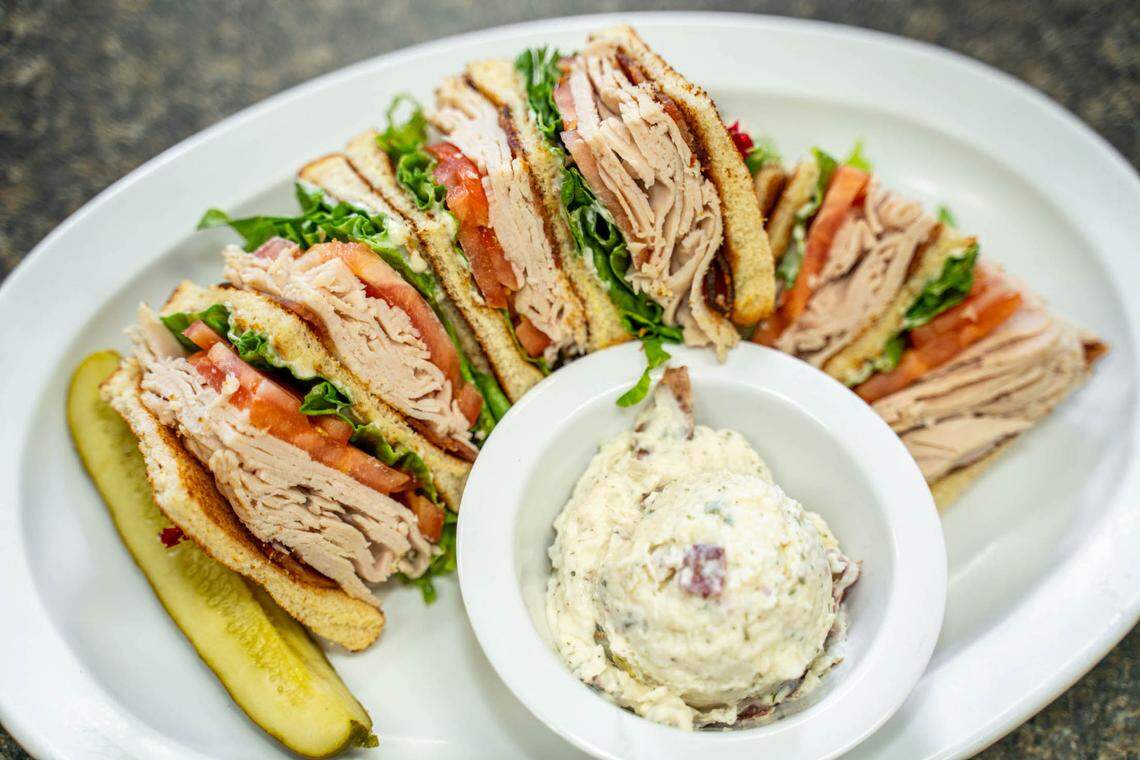 The club sandwich with potato salad at Phil’s Deli.