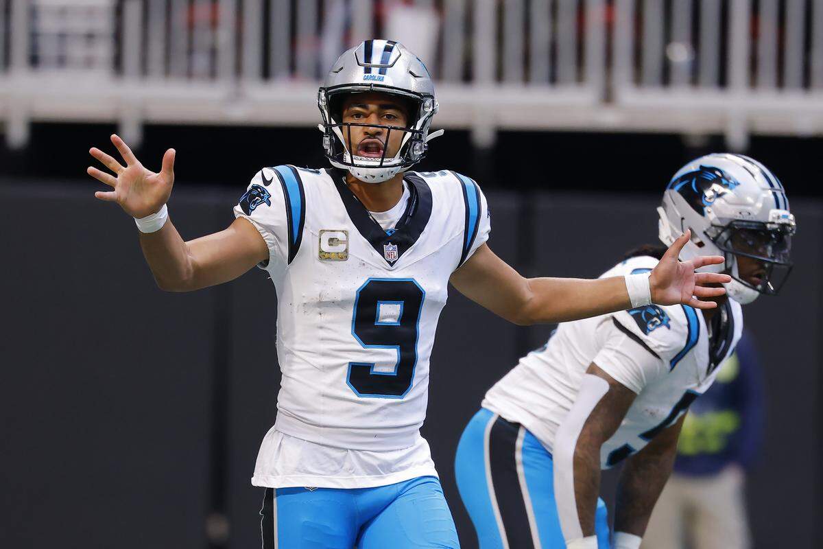 Carolina Panthers QB Bryce Young directs his team during the second quarter against the Atlanta Falcons on Sunday at Mercedes-Benz Stadium in Atlanta.