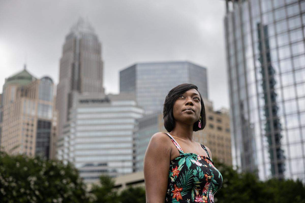 Princess Harris, a teacher, poses for a portrait in Charlotte, N.C., on Friday, July 1, 2022.