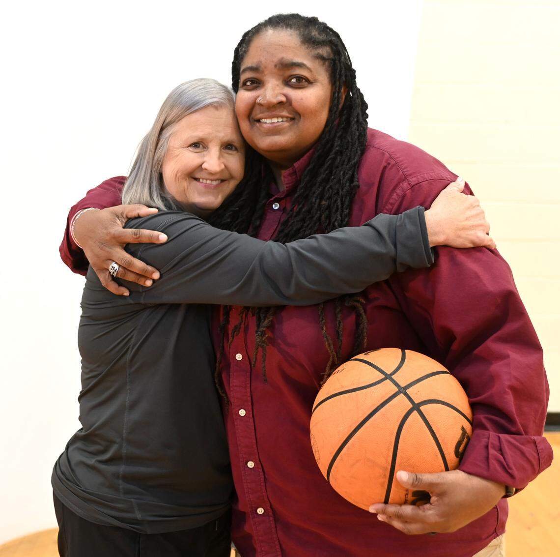 Myers Park girls head basketball coach Barbara Nelson, left and former Providence Day basketball star Konecka Drakeford, right, are the coach and player of the Sweet 16 era (1984-present) on Tuesday, March 19, 2024.