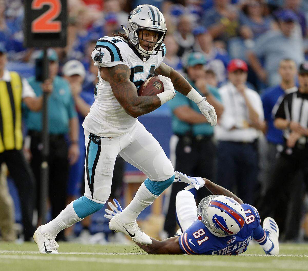 If the preseason is any indication, Carolina Panthers linebacker Shaq Thompson, left, is due for a monster year.  What motivates Thompson, though, is about more than football.
