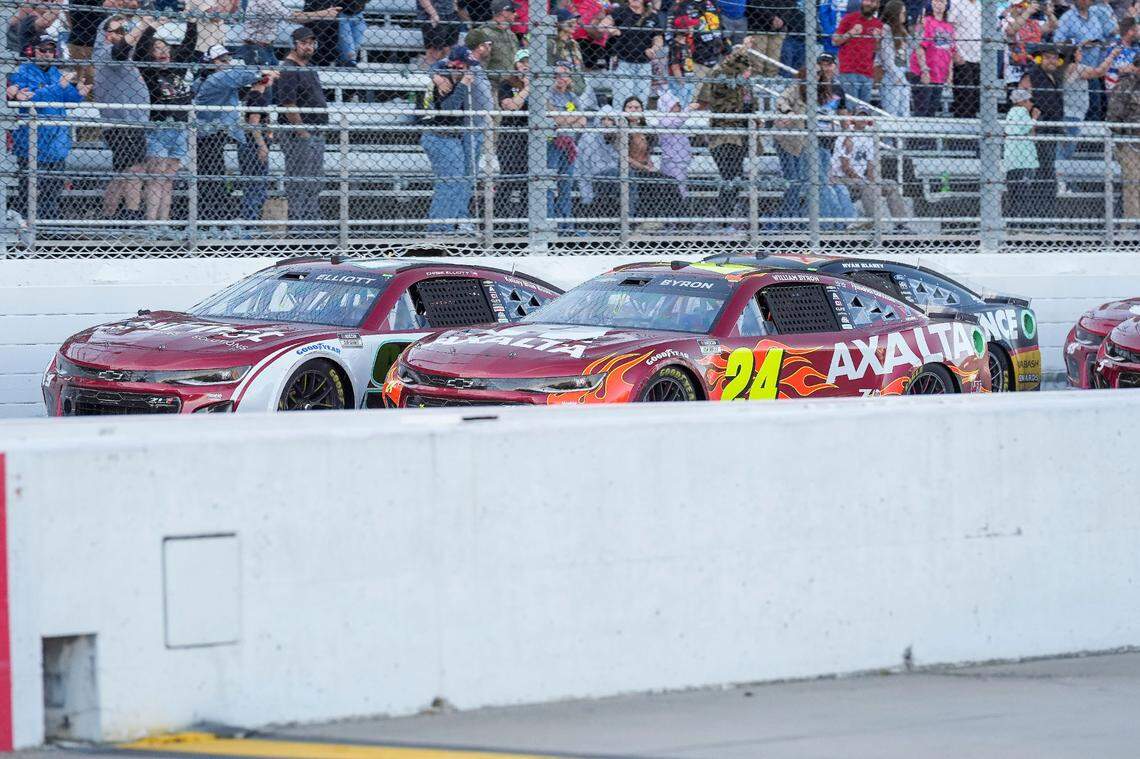 Apr 7, 2024; Martinsville, Virginia, USA; NASCAR Cup Series driver William Byron (24) and driver Chase Elliott (9) at the late restart during the Cook Out 400 at Martinsville Speedway.