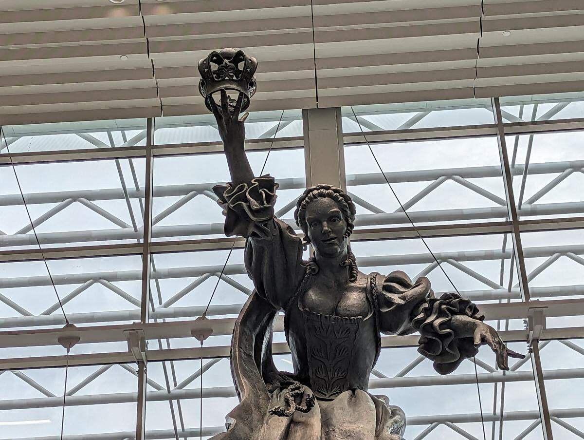 The iconic Queen Charlotte statue was unveiled in the main terminal lobby Friday as part of CLT’s $600 million lobby expansion project.