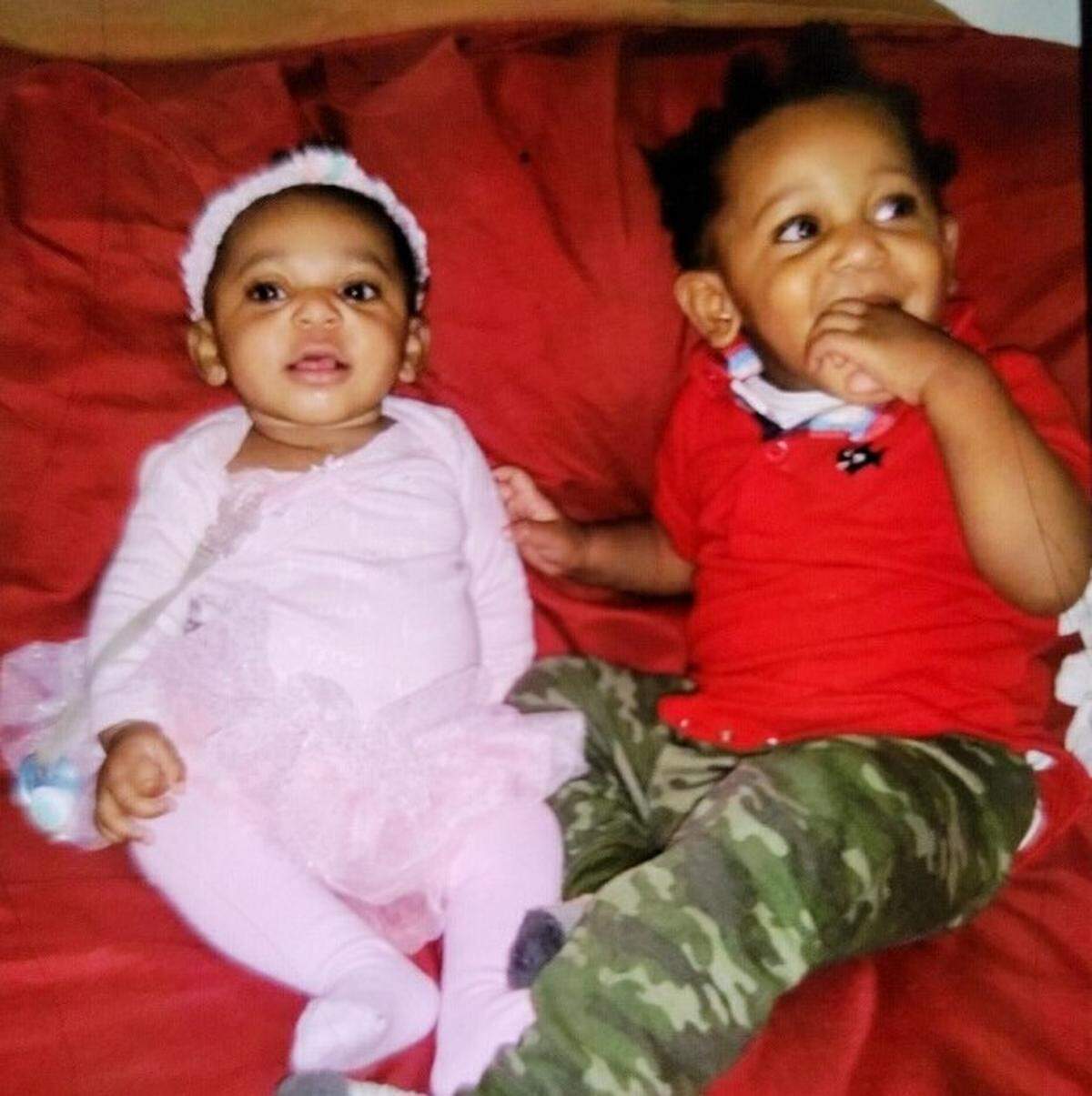 Brandy Winston of Charlotte is guardian of her two grandchildren, Ashanti Winston, left, and Denterrio Morris Jr. They were receiving presents from the Salvation Army’s Angel Tree program.
