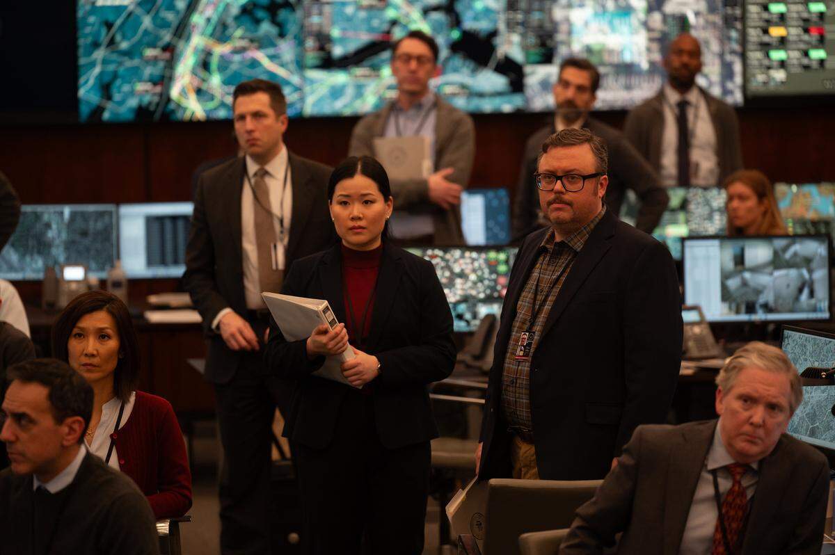 Eden Lee, center left, and other cast members in “Zero Day.” The show centers around the aftermath of a lethal national cyber attack.