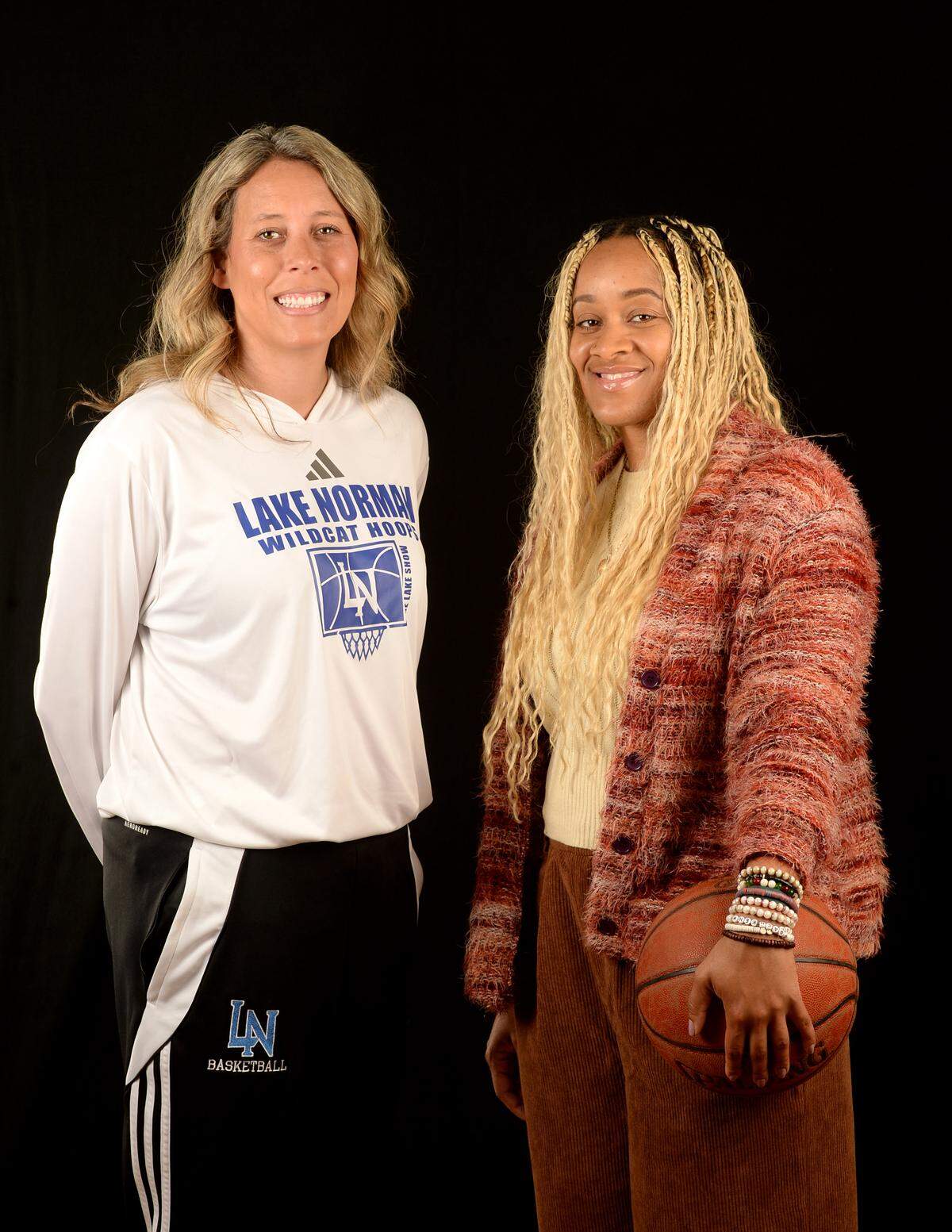 All-Observer co-coaches of the year Lake Norman’s McKenzie Graham and Queen’s Grants Kendria Holmes.