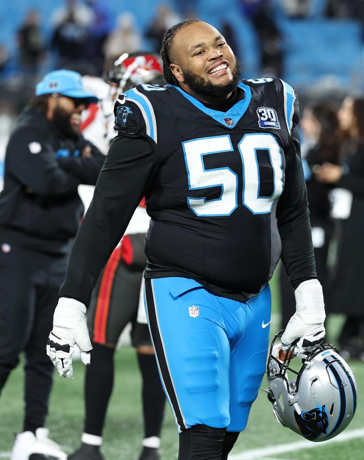 Carolina Panthers guard Robert Hunt walks off the field following the team’s 26-23 loss to the Tampa Bay Buccaneers at Bank of America Stadium in Charlotte, NC on Sunday, December 1, 2024.