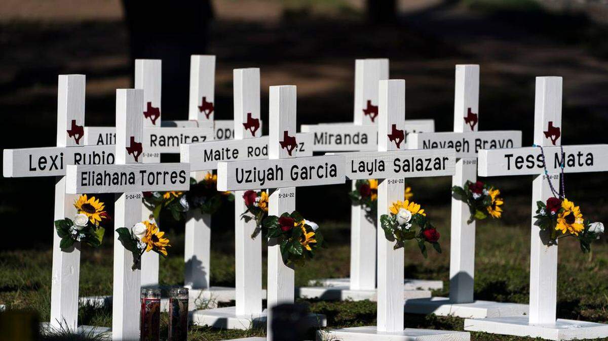 Crosses with the names of children killed at Robb Elementary School in Uvalde, Texas on May 26, 2022. An 18-year-old gunman slaughtered 19 children and two teachers at the school.