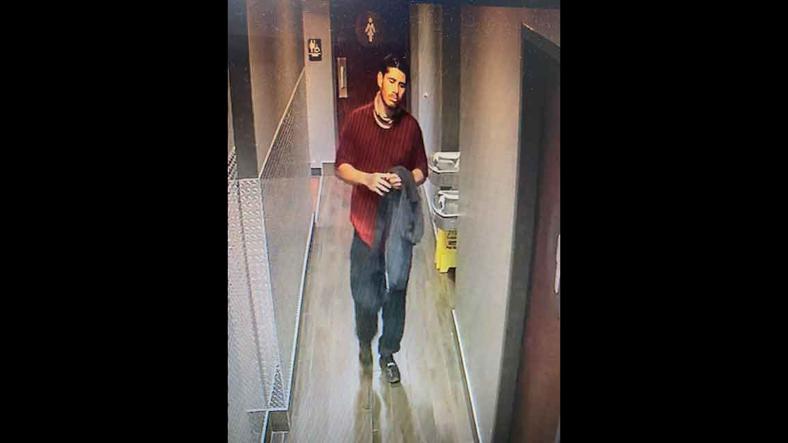 Police are looking for a man who they said is wanted for questioning in a kidnapping case in which a driver at a red light was held at knifepoint and forced to drink a substance that made him pass out.