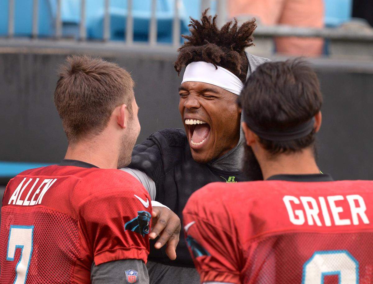 Cam Newton shared a happy moment in training camp prior to his latest injury with quarterbacks Kyle Allen (left) and Will Grier. Allen will replace Newton for the second game in a row against Houston Sunday.