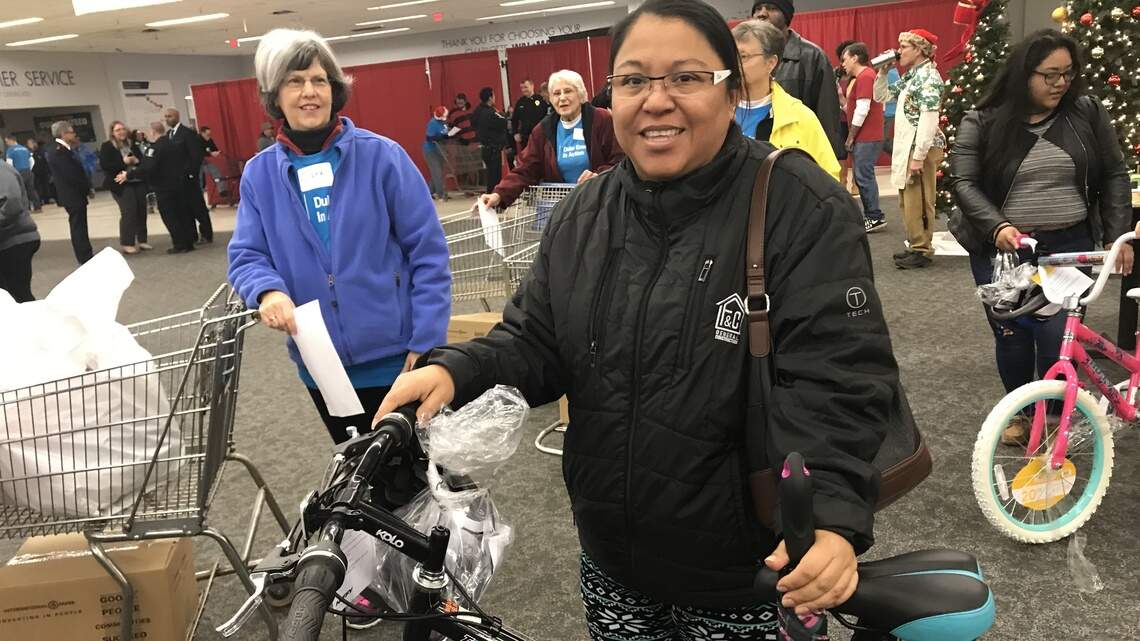 Big smiles from moms and dads as Salvation Army kicks off toy distribution