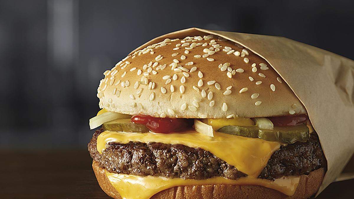 The FBI says two Charlotte men robbed a McDonald’s on South Tryon Street, then one of them came back a few hours later to collect the change from his drive-thru order moments before the robbery.