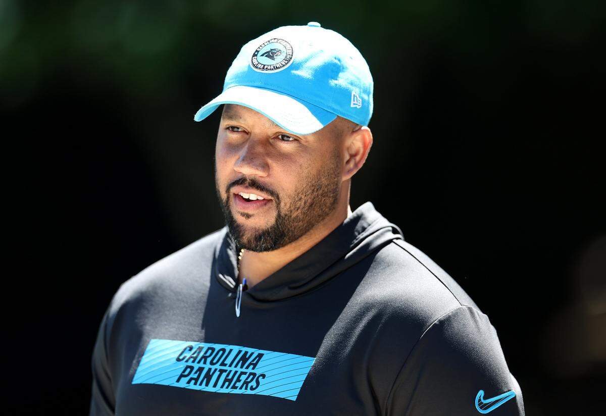 Carolina Panthers director of college scouting Jared Kirksey walks to rookie minicamp practice on May 9, 2025.