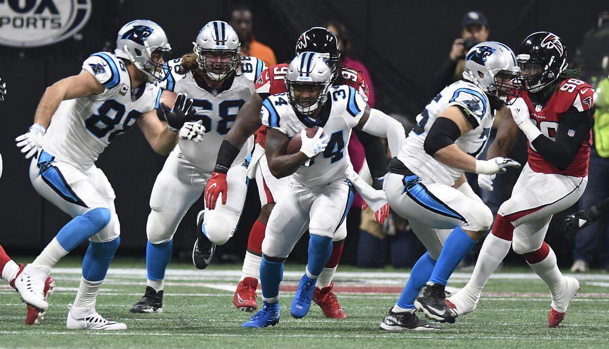 Carolina Panthers running back Cameron Artis-Payne (34) will get the first shot at the power-back job, and a head start on any rookie, after the departure of veteran Jonathan Stewart.