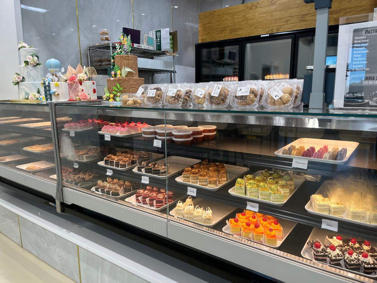 Triveni’s dessert case is stocked with cakes, macarons and other sweet bites.