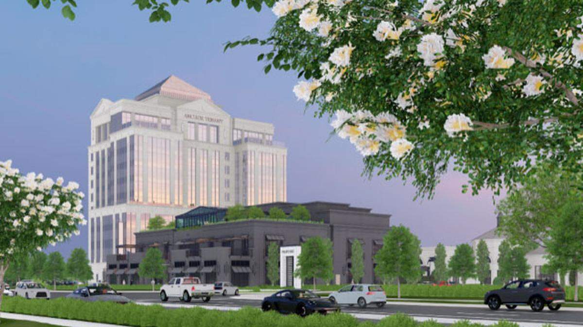 Simon Property Group, owner of SouthPark mall, buys nearby hotel at Phillips Place in Charlotte. Local developer Lincoln Harris is building a 10-story tower at the center.