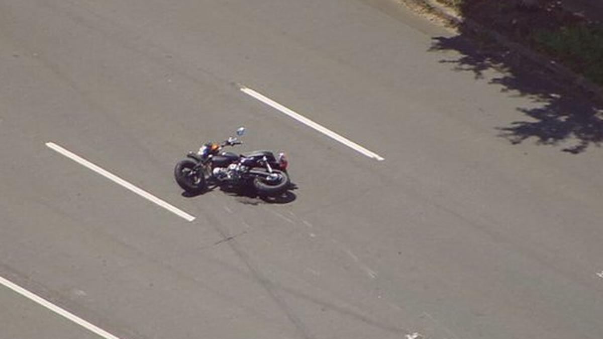 The motorcycle ridden by 81-year-old Patrick Carlos Ramia sits on Freedom Drive on Tuesday, Aug. 9, 2022.