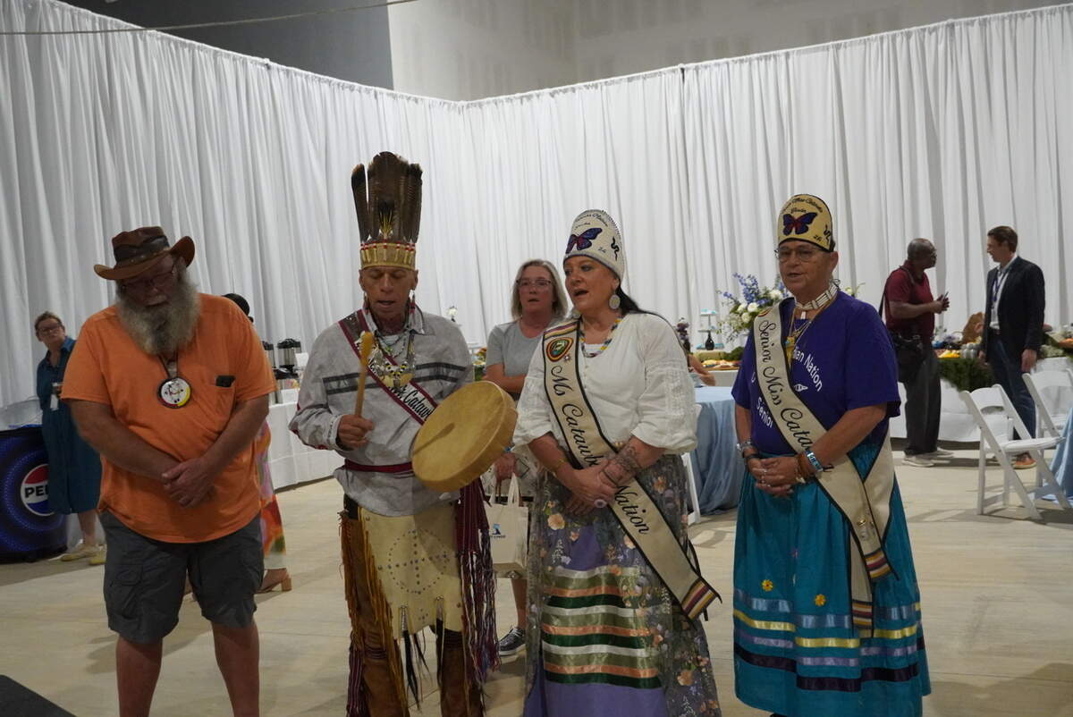 Ceremonial Catawba Nation Indigenous performers sing after the ribbon cutting, showing the culture of the Catawba to the attendees at Wednesday’s ceremony.