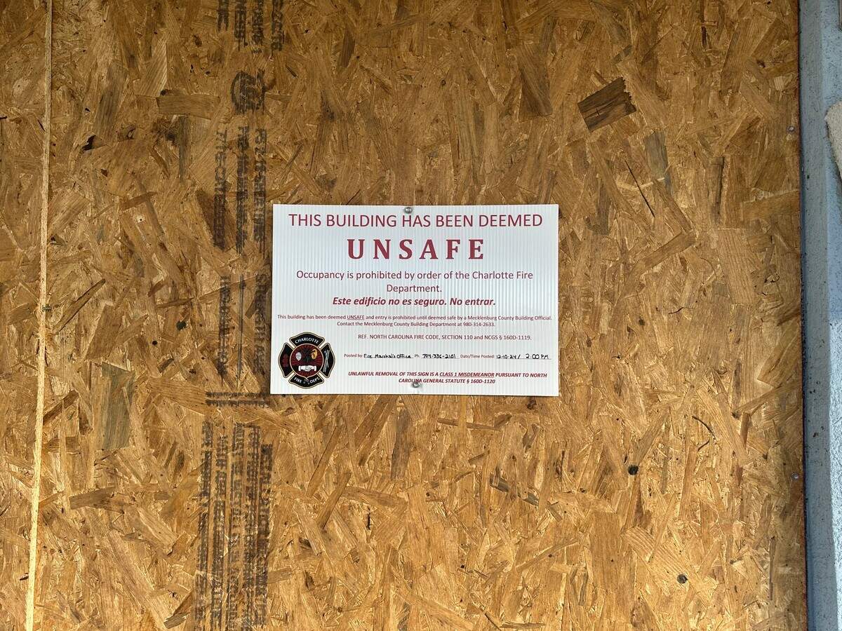 One of several signs posted by the Charlotte Fire Marshal’s office deeming the building unsafe and prohibiting it from being occupied. The signs were dated December 10.