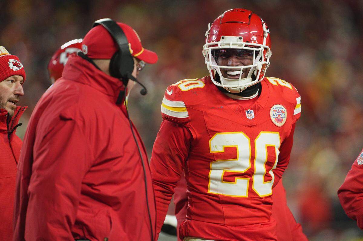 Jan 18, 2025; Kansas City, Missouri, USA; Kansas City Chiefs head coach Andy Reid (left) talks with safety Justin Reid (20) during the fourth quarter of a 2025 AFC divisional round game against the Houston Texans at GEHA Field at Arrowhead Stadium. Mandatory Credit: Jay Biggerstaff-Imagn Images