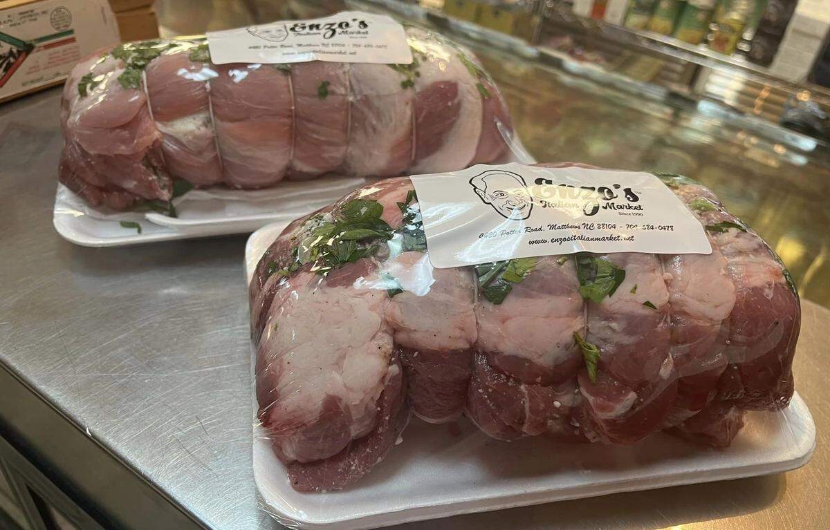 Enzo’s porchetta seasoned with salt, pepper, grated pecorino Romano, light fresh garlic, chopped fresh parsley and sage.
