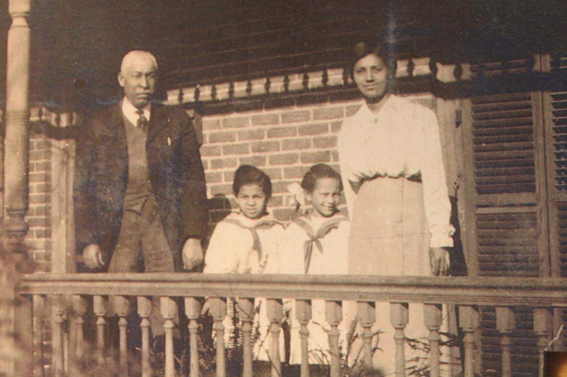 An undated family portrait of Dr. Manassa T. Pope, his wife, Delia, and daughters Ruth and Evelyn.