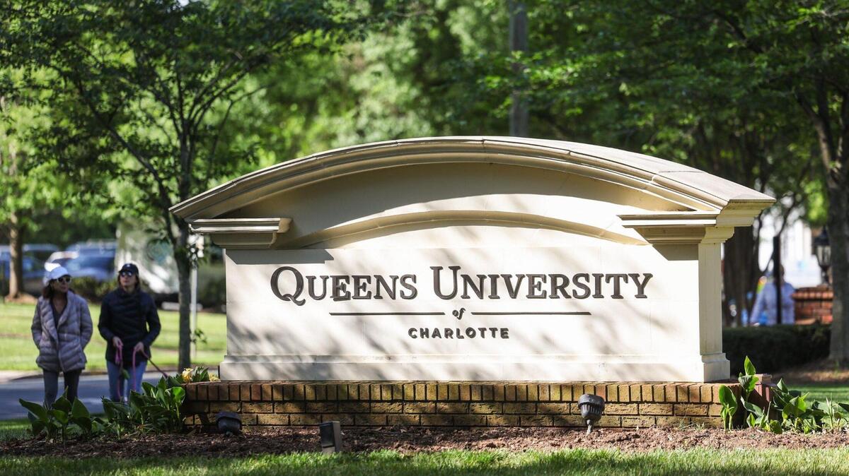 Queens University says it will make layoffs, leave some positions open and other cost-cutting measures after it missed enrollment goals. It says a new Federal Application for Student Aid is partly to blame.