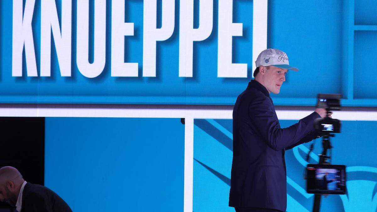Kon Knueppel looks on after being selected as the fourth pick by the Charlotte Hornets in the first round of the 2025 NBA Draft at Barclays Center.