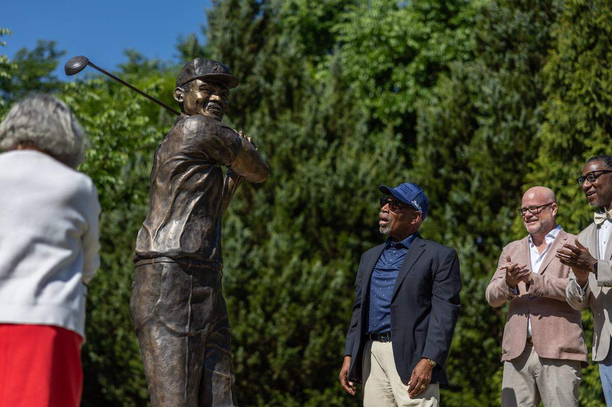 Dr. Charles Sifford’s son, Charles Sifford Jr., reacts to the unveiling of a commemorative statue honoring Dr. Charles Sifford, a Charlotte native and the PGA TOUR’s first Black member at Elizabeth Park in Charlotte, N.C., on Tuesday, May 5, 2026, in an event sponsored by the Truist Championship, in partnership with the Charlotte Trail of History.