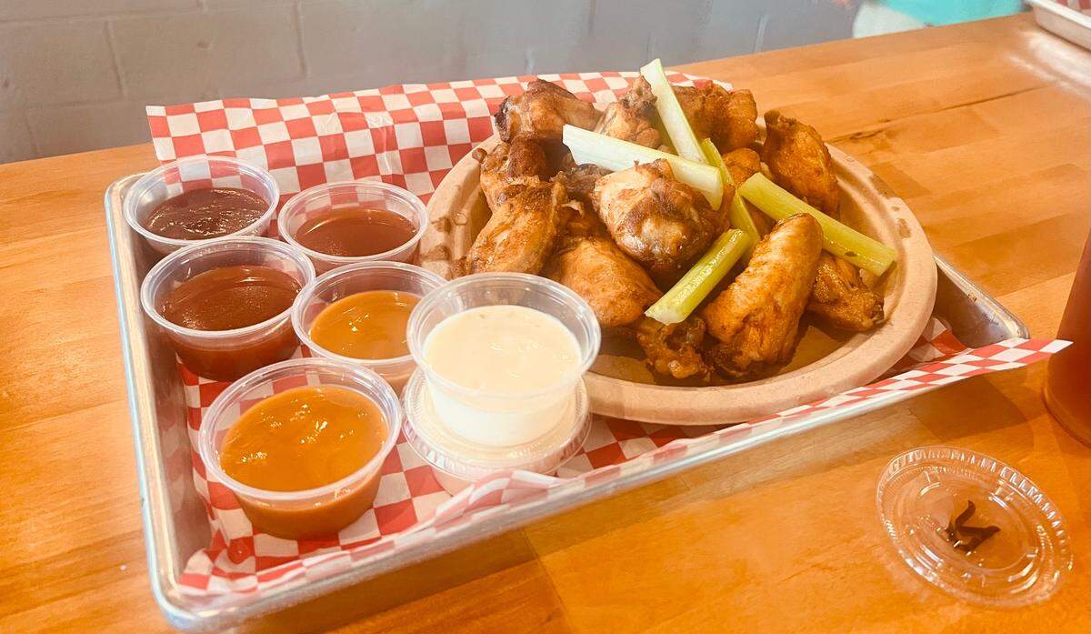The Crazy Pig’s smoked chicken wings come in a half order of six for $7.50 or a full order of 12 for $13, plus celery and dipping sauce.