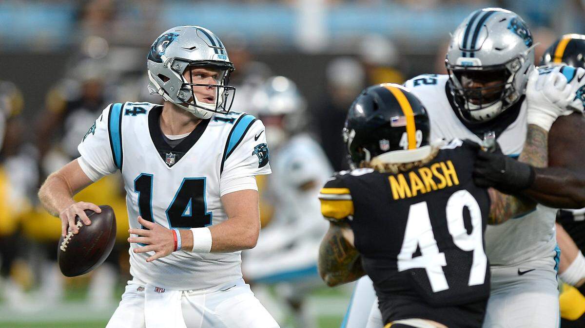 Carolina Panthers quarterback Sam Darnold looks to pass to a receiver during the first quarter against the Pittsburgh Steelers Friday. Darnold threw for 162 yards and two TDs in one half of action.