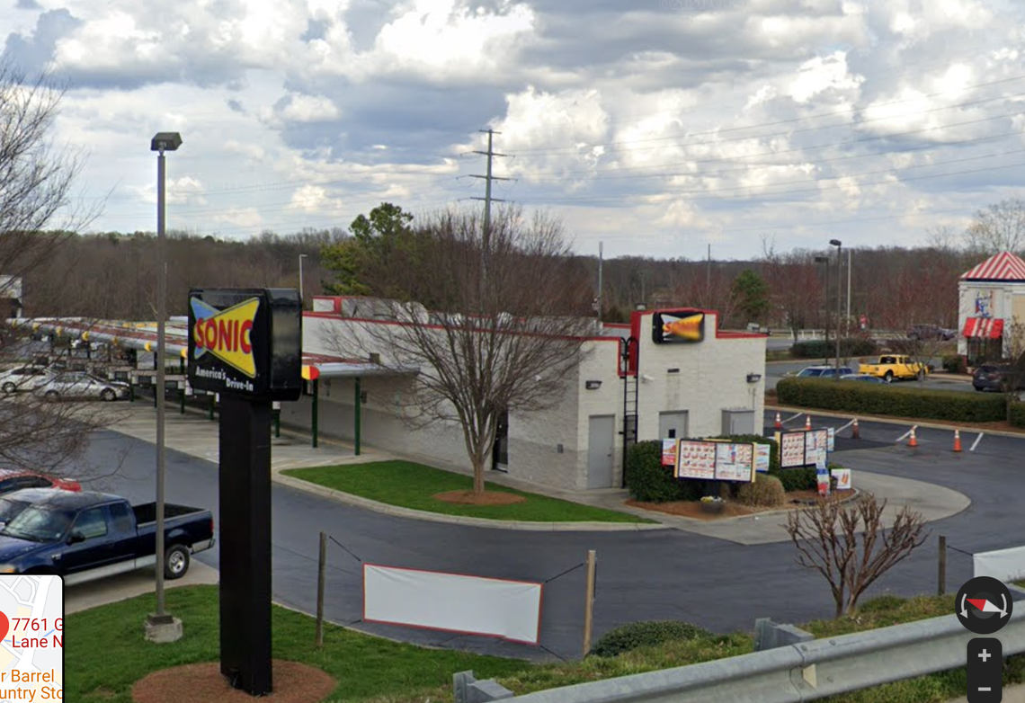 One Concord, N.C., police officer was shot and killed and a second officer was wounded during an exchange of gunfire with a suspect late Wednesday at this Sonic Drive-In, officials say