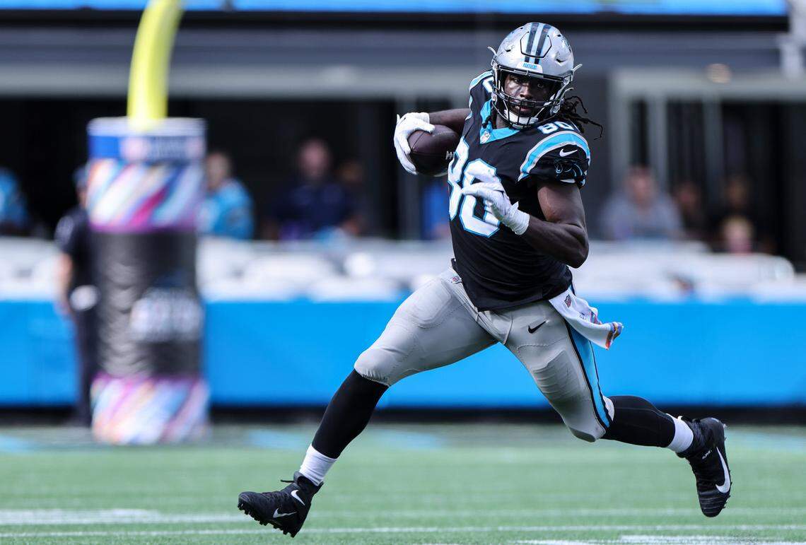 Carolina Panthers Ian Thomas runs the ball against the Philadelphia Eagles at the Bank of America Stadium in Charlotte, N.C., on Sunday, October 10, 2021.