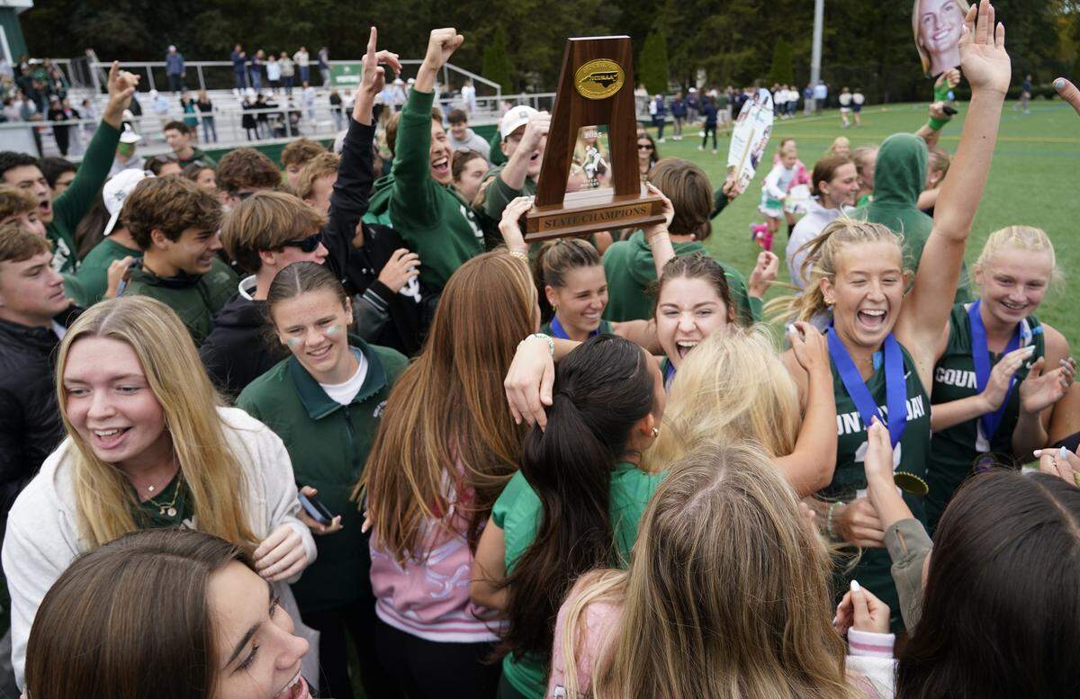Charlotte Country Day field hockey players celebrate after winning the NCISAA field championship. The school is a popular private school choice for families in the Charlotte area. 