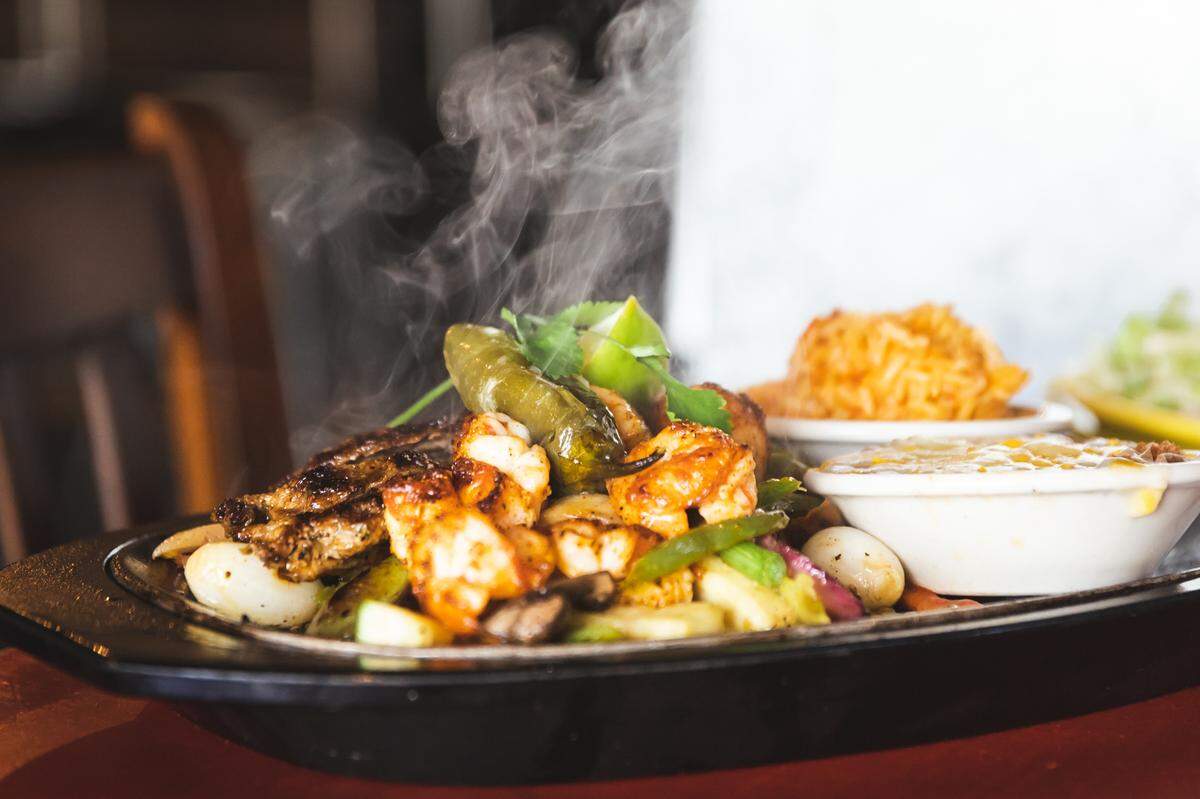 Seen here are fajitas from Paco’s Tacos & Tequila, which is now open in Fort Mill. The region has seen an influx of Mexican food restaurants.