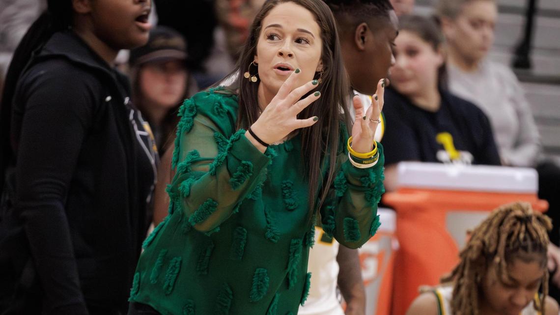 Independence Patriots head basketball coach Lauren Galvani (center) has accepted an offer to coach college basketball at Lees-McRae.