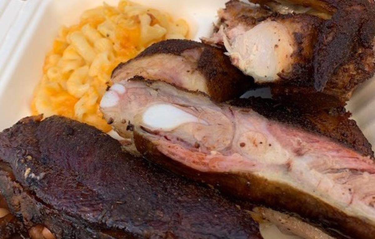 Mac and cheese, chicken and ribs from Sweet Lew’s.