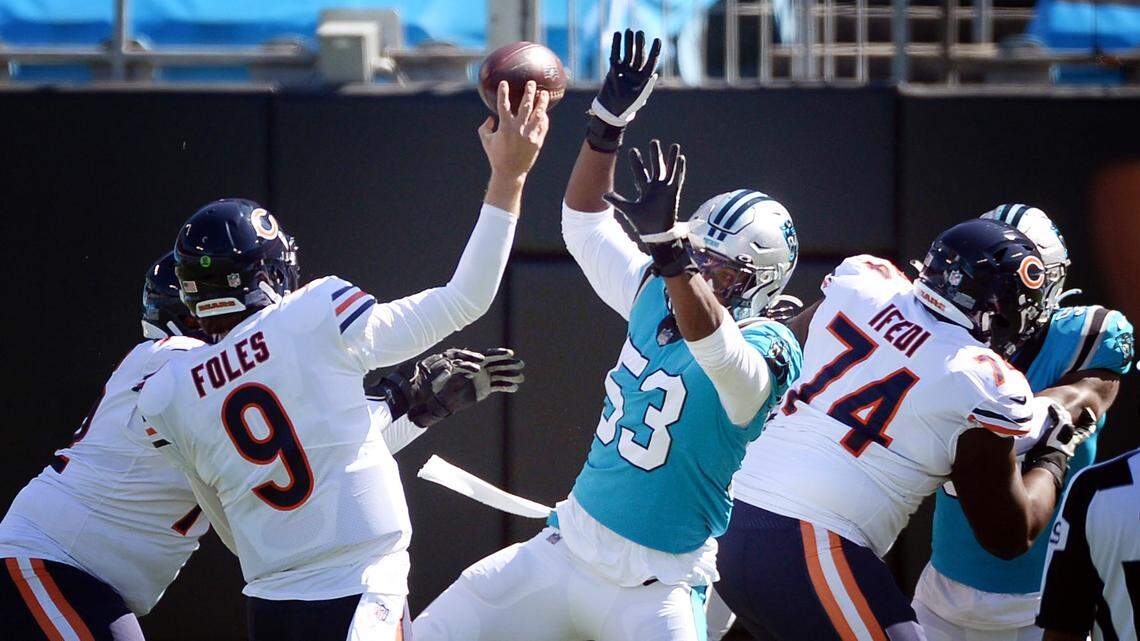 Carolina Panthers defensive end Brian Burns pressures a throw from Chicago Bears quarterback Nick Foles (9) on Oct. 18th. Burns had three QB hits in the game, but no sacks.