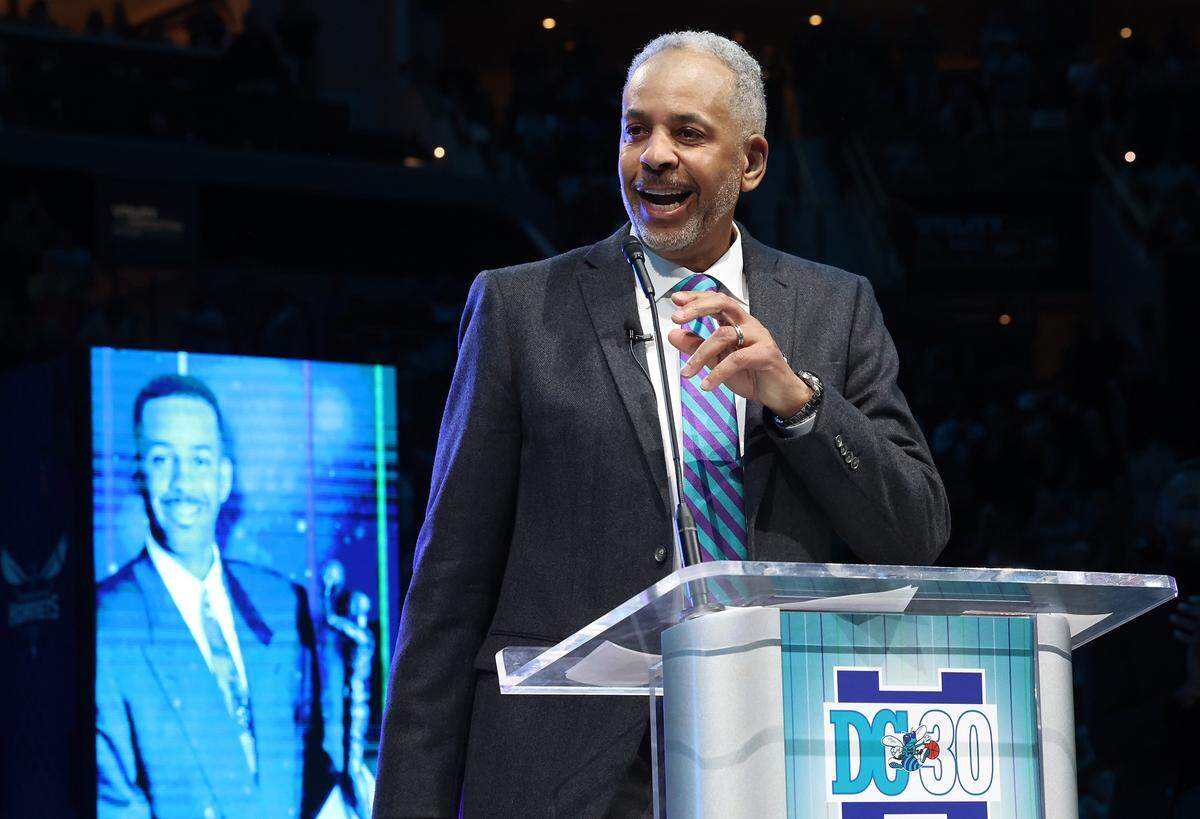 Former Charlotte Hornets forward Dell Curry speaks during his jersey retirement ceremony at Spectrum Center on Thursday, March 19, 2026. The Charlotte Hornets retired Dell Curry's number 30 jersey and lifted a banner into the rafters during half-time of the team's game against the Orlando Magic.