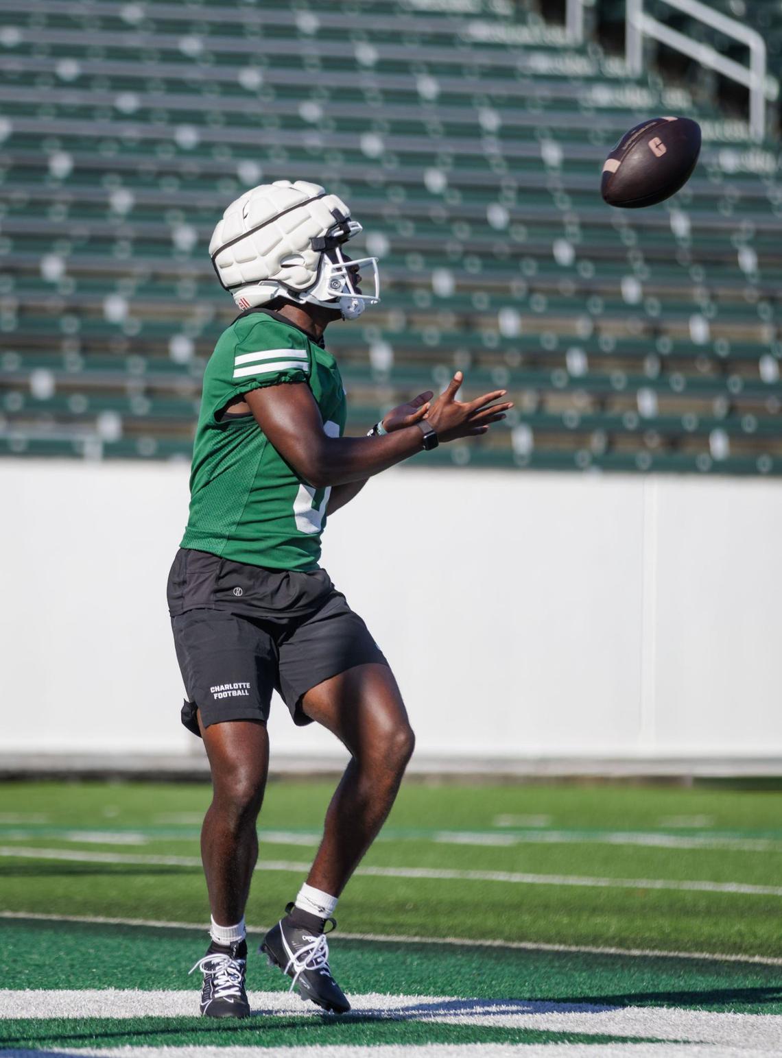 Junior Jarius Mack (center) runs through scrimmage drills during the final intrasquad game at Jerry Richardson Stadium Saturday August 24, 2024.
